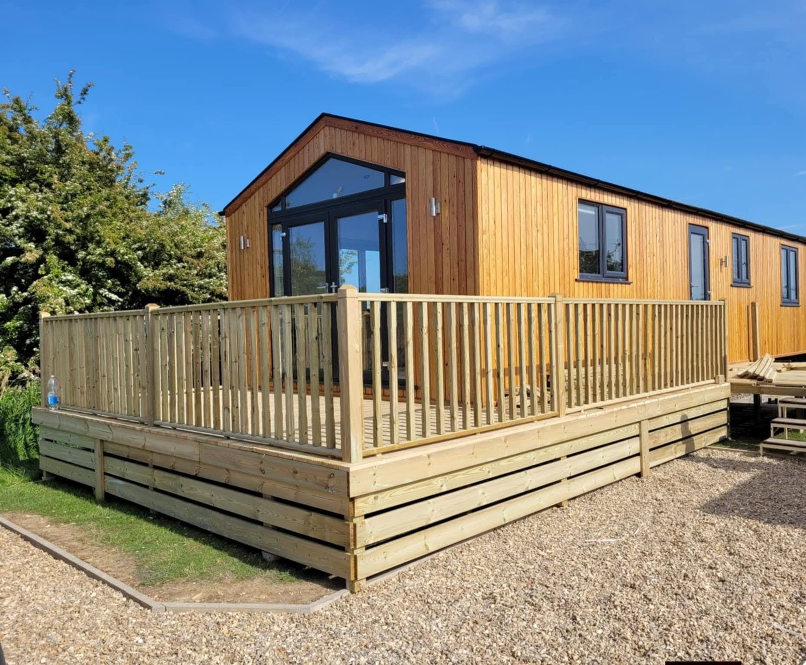 Professional decking patio area attached to a cabin